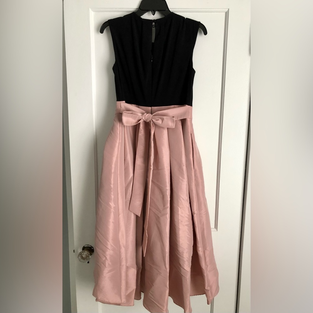 Black and soft pink satin cocktail dress. Never worn.